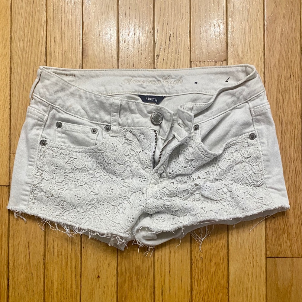White crochet distressed jean shorts